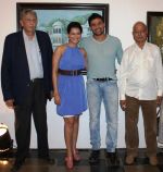Wrestler Sangram Singh with Payal Rohatgi and curator Nitin Shete with artist Houserao Patil at Nitin Shete_s  Eclectic Blend-- collection of works by  veteran artists at Coomaraswamy hall.jpg